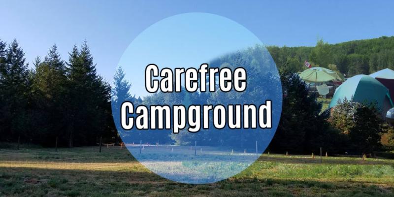 photo of open pasture with pine trees and blue sky with the words Carefree Campground in the middle